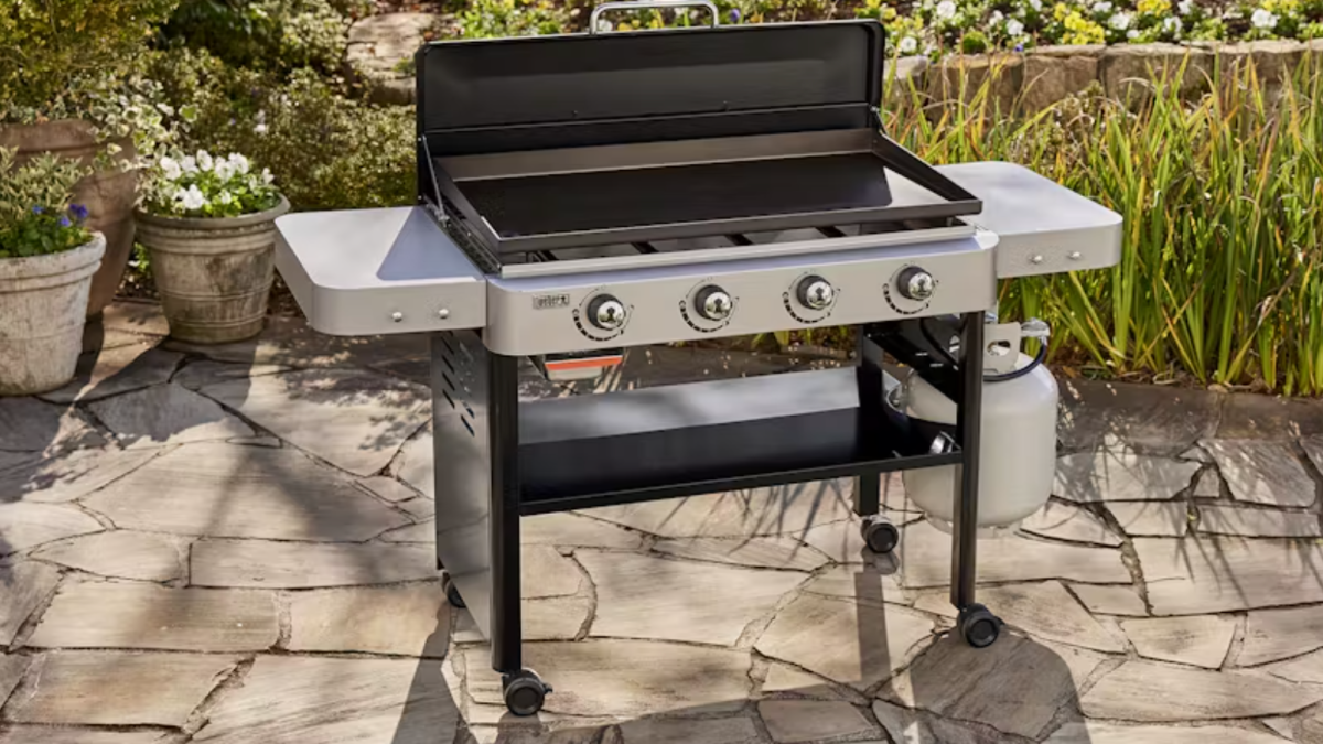 a large weber griddle anchors a serene patio