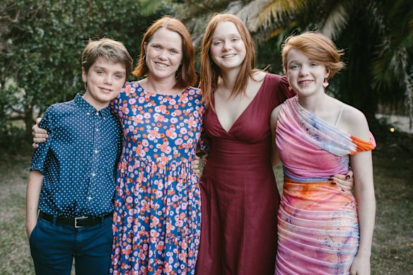 Dr Kaylene Henderson (with her children, who prefer their names not being published), says parents are carrying a heavier load now than in the past.