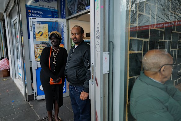 Woww Grocery owner Alex Embaye and friend Nyambol Muorter.