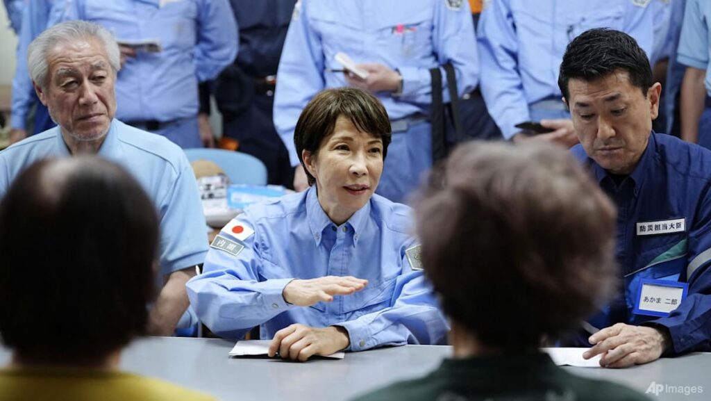 Japanese PM Takaichi visits quake-hit southern region as cleanup begins in intense heat Japanese PM Takaichi visits quake-hit southern region as cleanup begins in intense heat