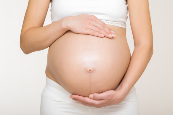 A woman has given birth to unrelated twins in Queensland.