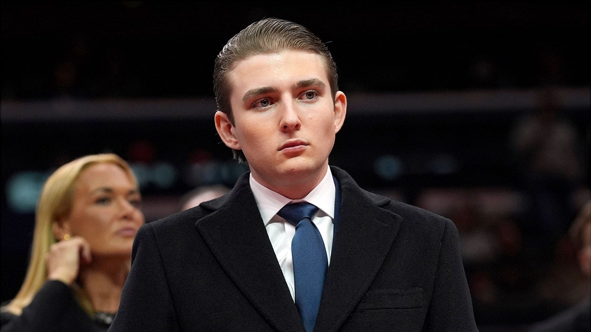 Barron Trump watches inauguration