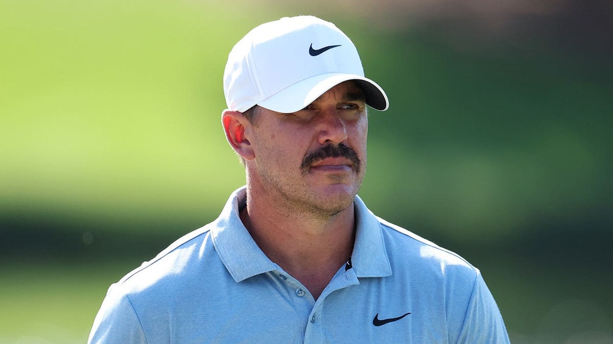 Brooks Koepka looks on from the 15th green during the Wyndham Championship.