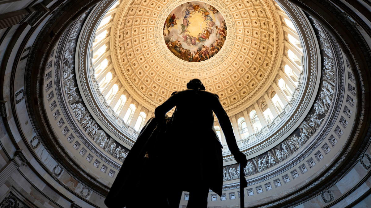 A view of a statue inside the U.S. Capitol rotunda.