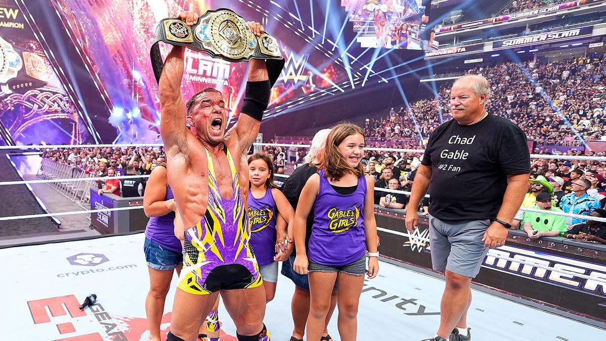 Chad Gable celebrates after winning the WWE Intercontinental Championship at U.S. Bank Stadium.