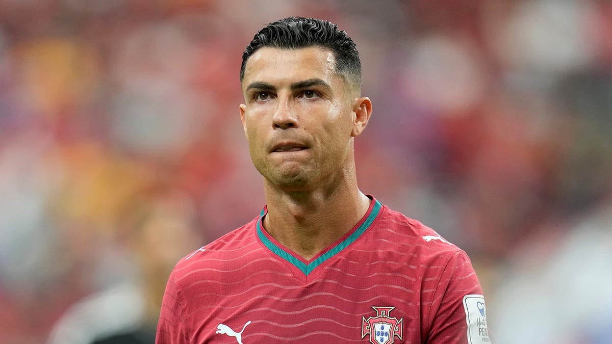 Cristiano Ronaldo leaving the pitch after the first half during a soccer match in Houston