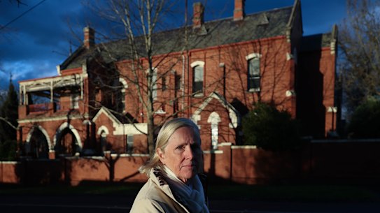 Surrey Hills resident Sally Forrester outside the former St Joseph’s boys’ home, which a developer wants to turn into apartments.