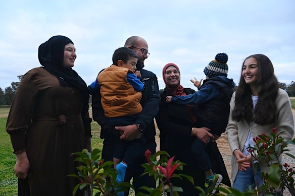 Abdullah and Ahlam Sultan (centre) with their children (from left) Ayah, Junayd, Salahudeen and Hiba at their property in Young. 