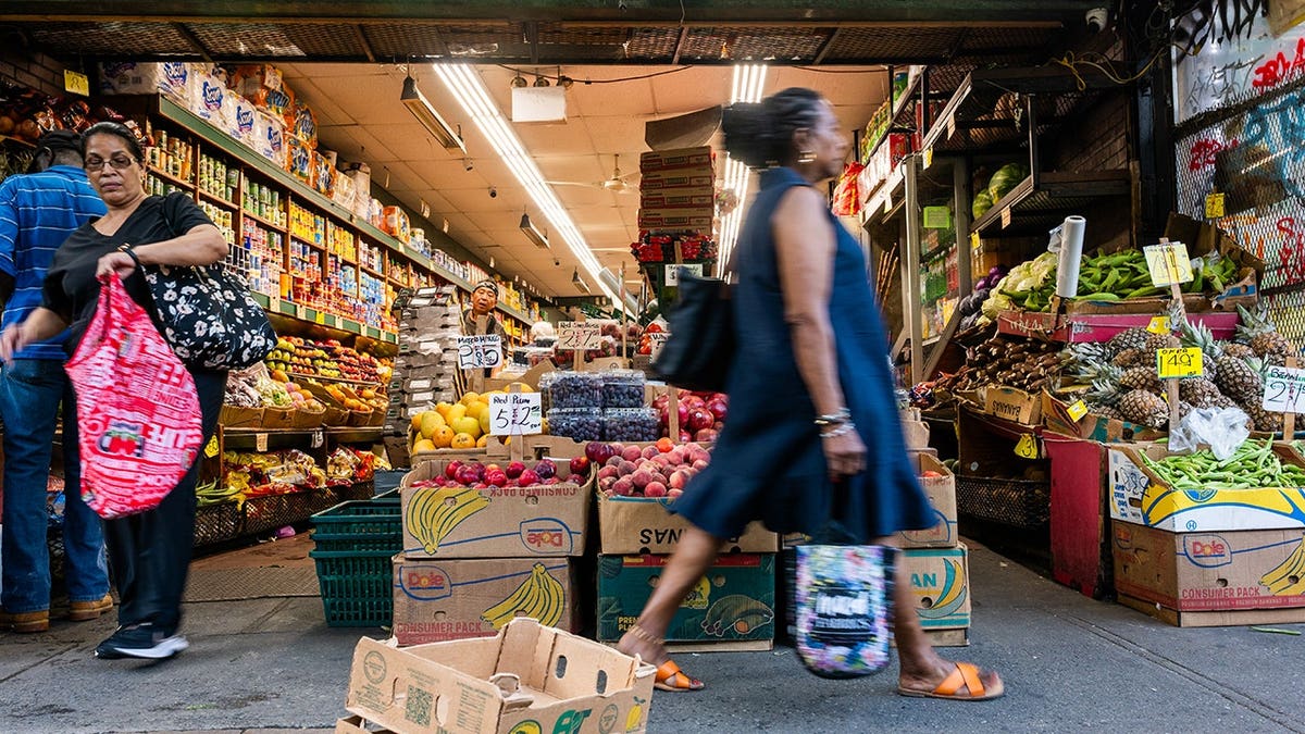 Grocery store stands along a street in Brooklyn.