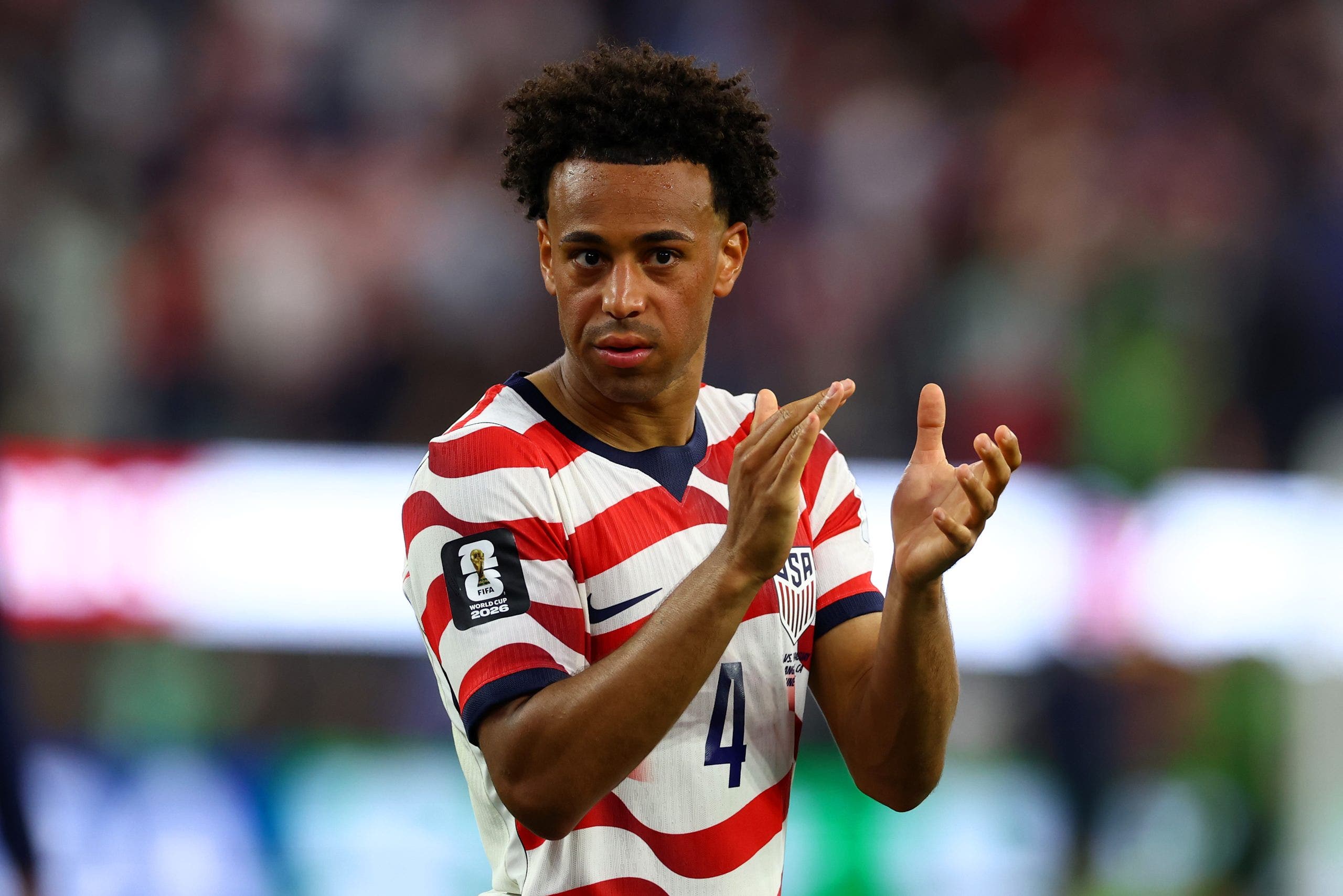 Tyler Adams claps to the USA fans after the win over Paraguay. (Chris Brunskill/Fantasista/Getty Images)