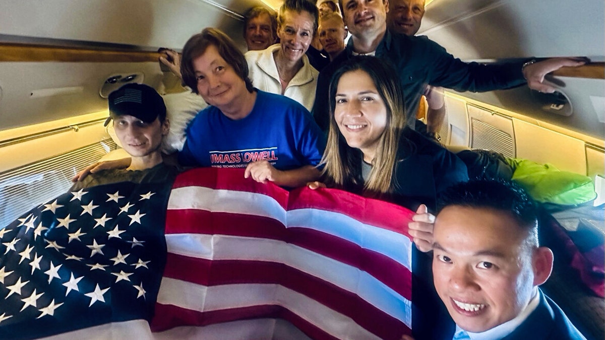 Former U.S. Marine Robert Gilman on the return flight home from Russia on Aug. 11, 2026.