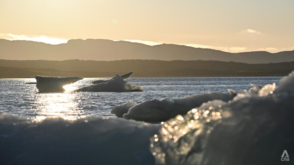 IN FOCUS: Greenland’s melting ice carries warnings far beyond the Arctic