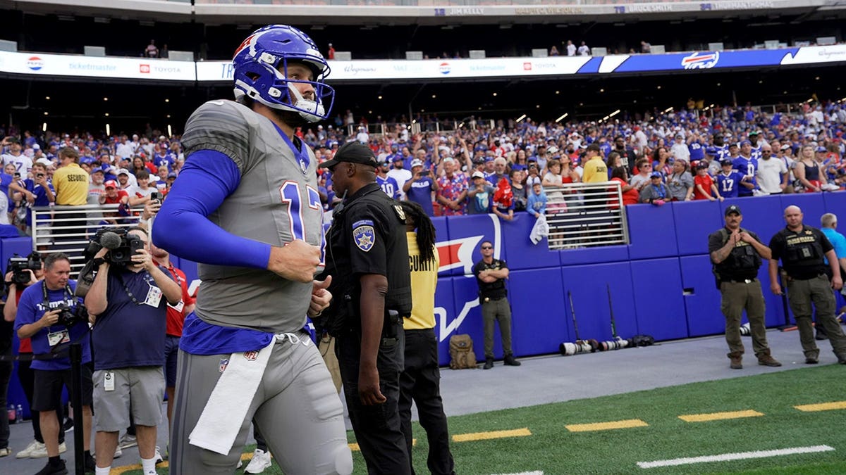 Josh Allen stands at Highmark Stadium during Bills practice in Orchard Park.