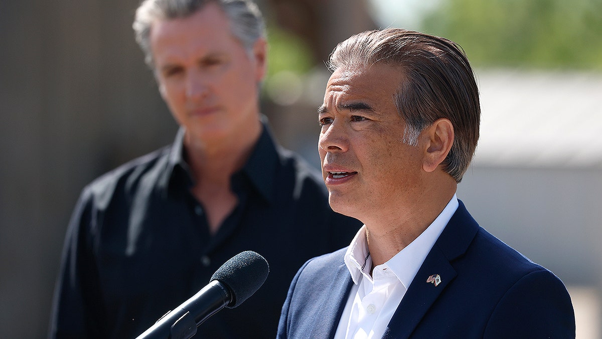 California Attorney General Rob Bonta next to California Gov. Gavin Newsom