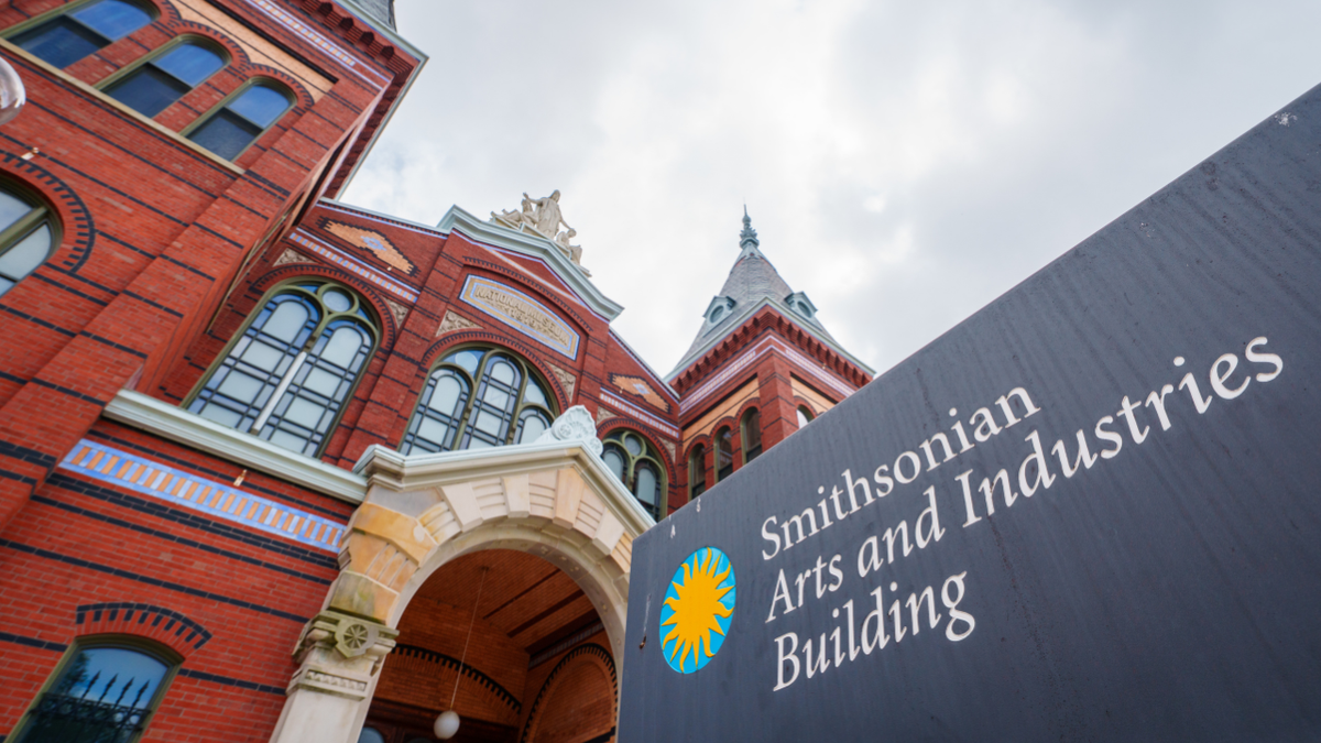 A sign marks the entrance to the Smithsonian Arts and Industries Building located along the National Mall on August 20, 2025, in Washington.