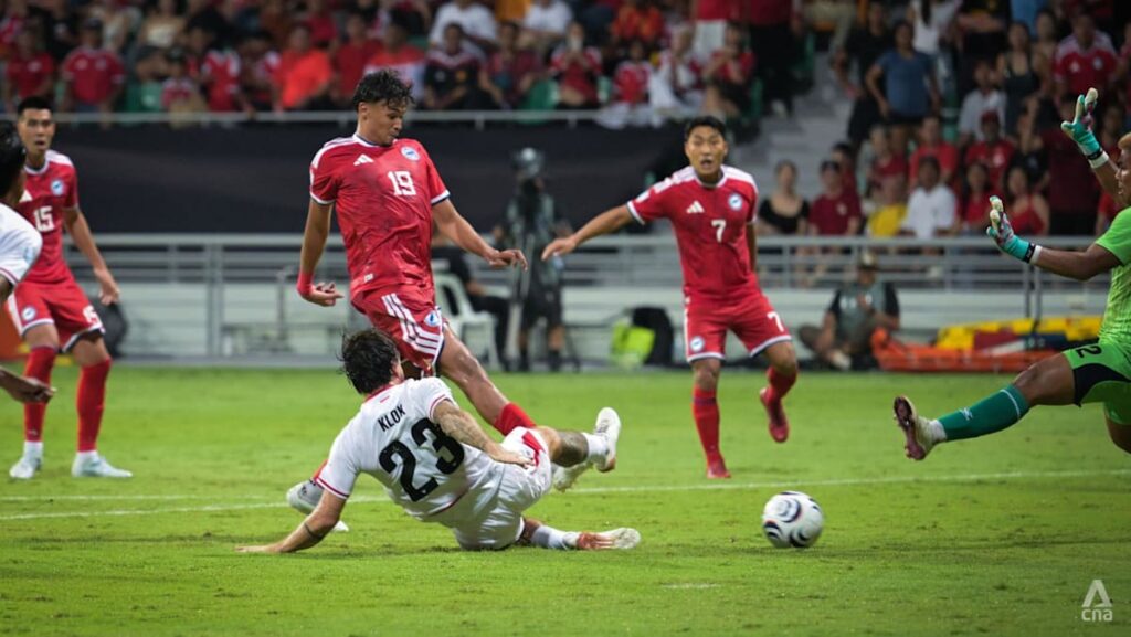 Singapore advance to ASEAN football championship semi-finals after draw with Indonesia Singapore advance to ASEAN football championship semi-finals after draw with Indonesia