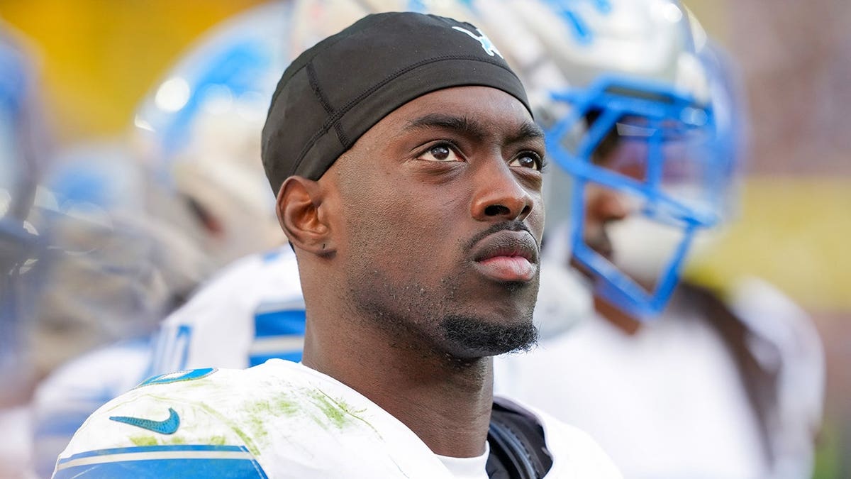 Terrion Arnold of the Detroit Lions looking on during an NFL game at Lambeau Field.