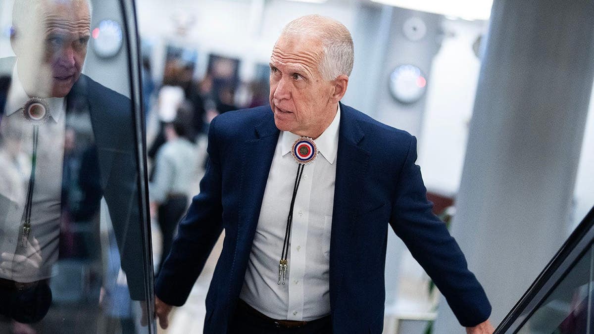 Sen. Thom Tillis walks in the U.S. Capitol.