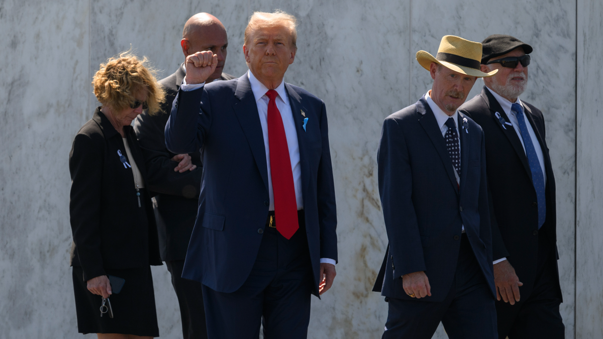 Donald Trump walks along the Wall of Names of the victims in Shanksville, Pennsylvania.