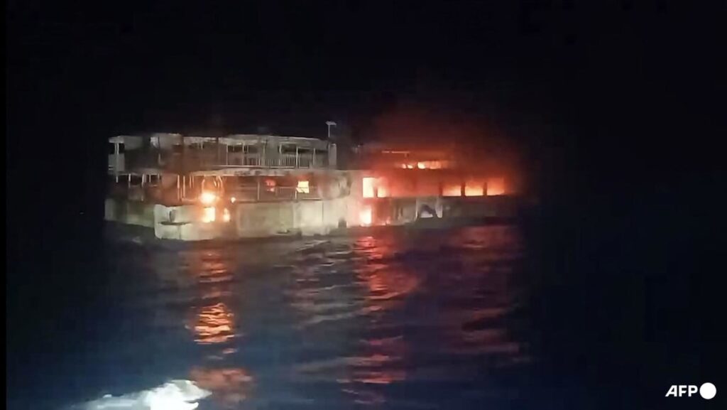 Philippines deploys vessels as rescuers seek access to burned ferry