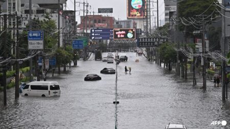 Canals full, roads submerged as Bangkok declares flood disaster
