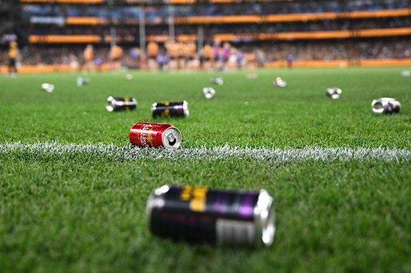 Cans and bottles on the ground at the MCG.