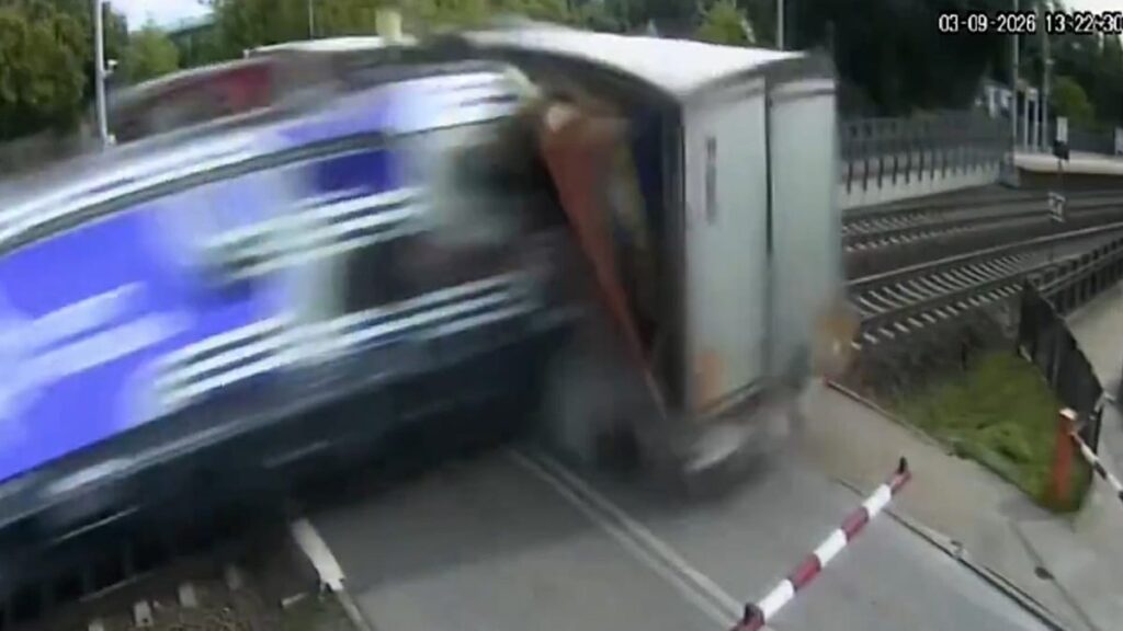 Driver of lorry hit by Polish train refused to break through barriers