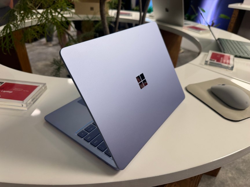 Microsoft 13-inch Surface Laptop 2nd Edition open with the back facing us showing the square Windows logo