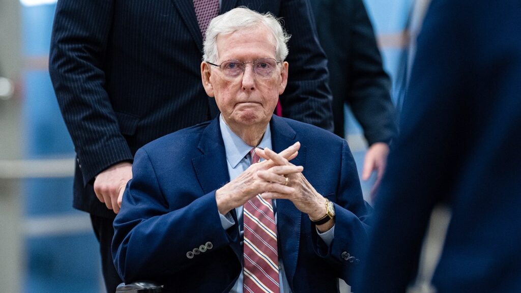 Mitch McConnell swarmed by security as reporter pleads: ‘Can you say a word for us?’