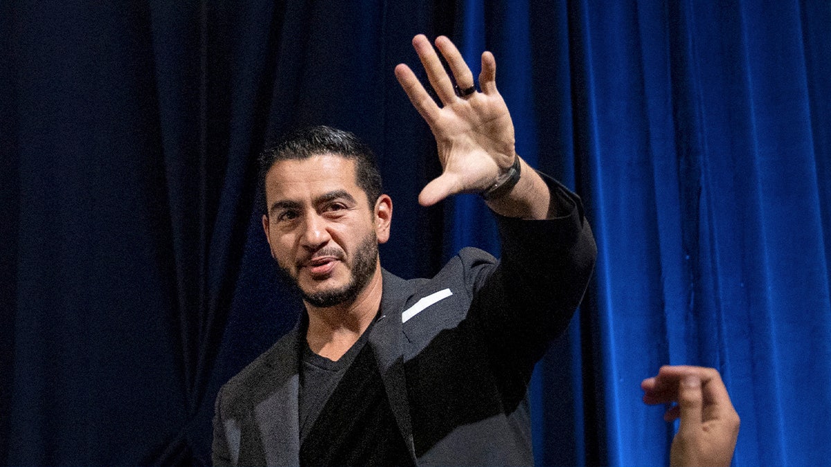 Abdul El-Sayed, US Democratic Senate candidate from Michigan, leaves the stage after speaking during the Michigan Democratic Party's 2026 nominating convention in Lansing, Michigan, US, on Saturday, Aug. 29, 2026. Since scoring a surprise victory in the Michigan Democratic primary, progressive Senate candidate El-Sayed is trying to push toward the middle to reach the more moderate electorate in a must-win state for the party in November. Photographer: Sarah Rice/Bloomberg via Getty Images
