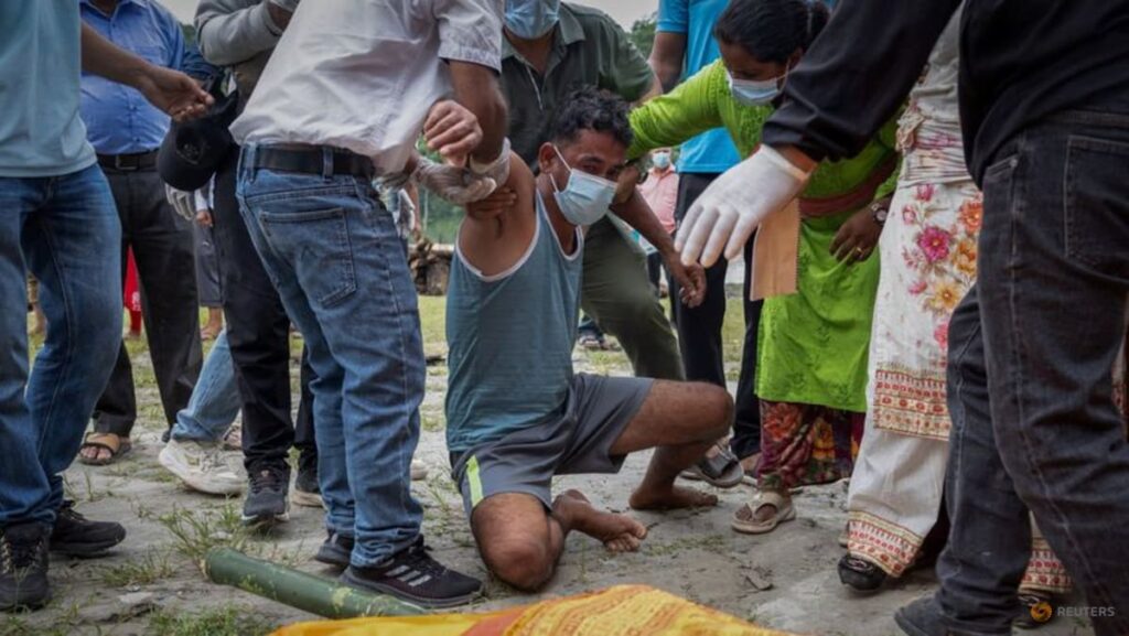 Nepali families hold symbolic funerals for missing after floods
