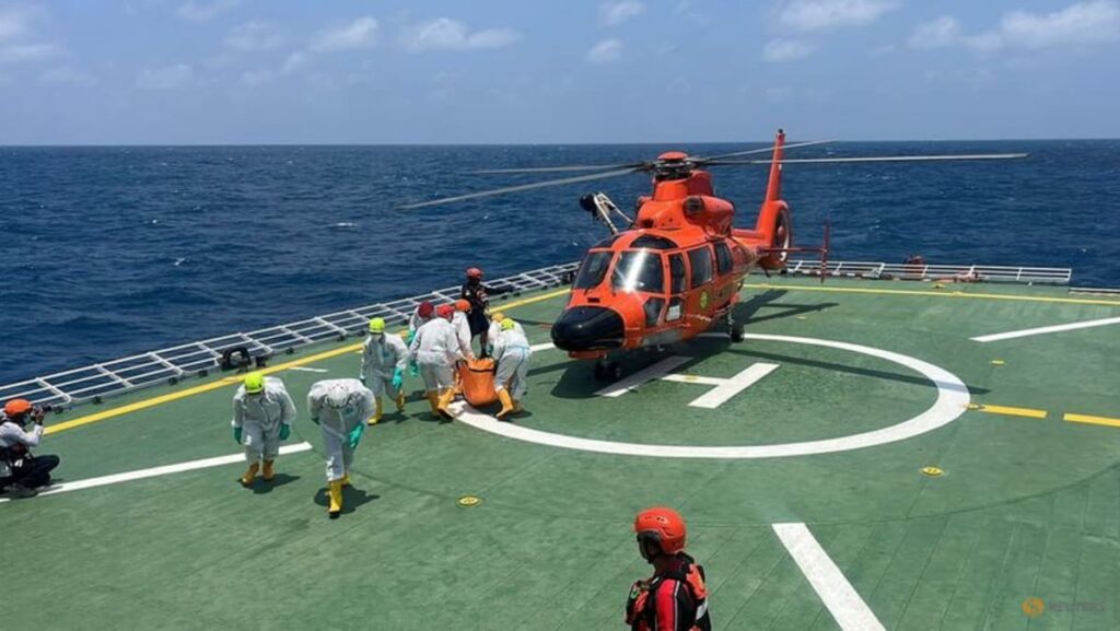 Death toll from capsized ship in Indonesia rises to 20 as search continues for 115 missing passengers