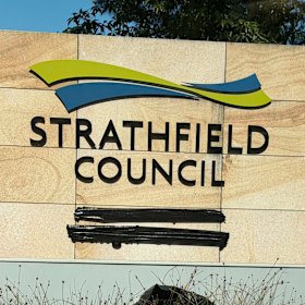Strathfield Council staff have taped up the phrases “Always was, always will be” and “Wangal Country” on some of the sandstone gateway signs.