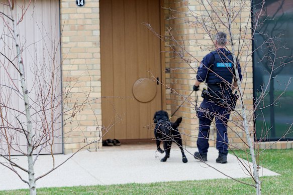 Police raid John Perkovic’s property.