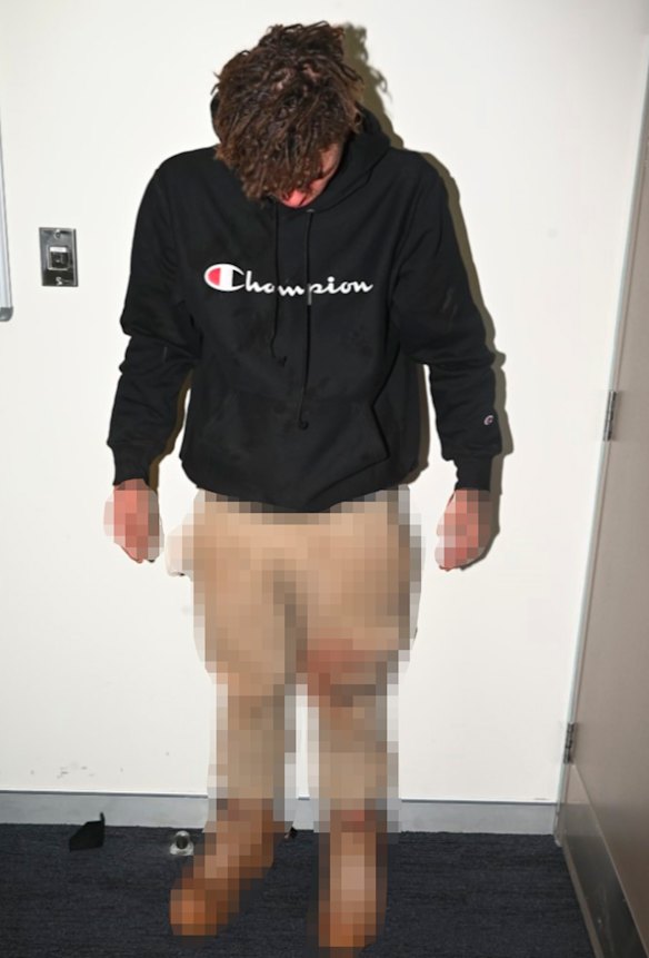 Daniel Billings pictured at Parkes Police Station in the hours after Molly Ticehurst’s murder.
