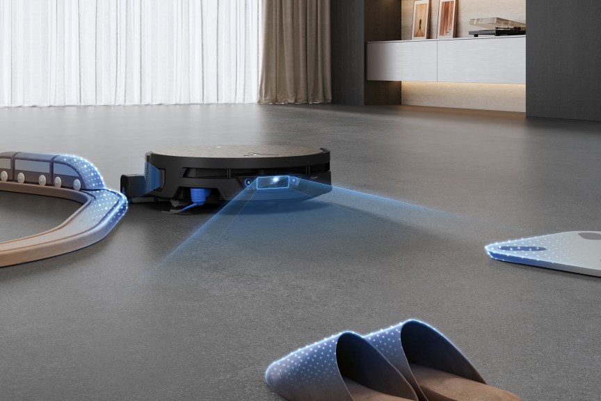 Robovac scanning the floor for obstacles.