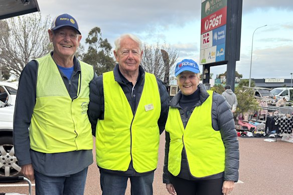 Rotary captain Trevor ridgwell, Ross Ballard and Melville Market manager Kareena Ballard.