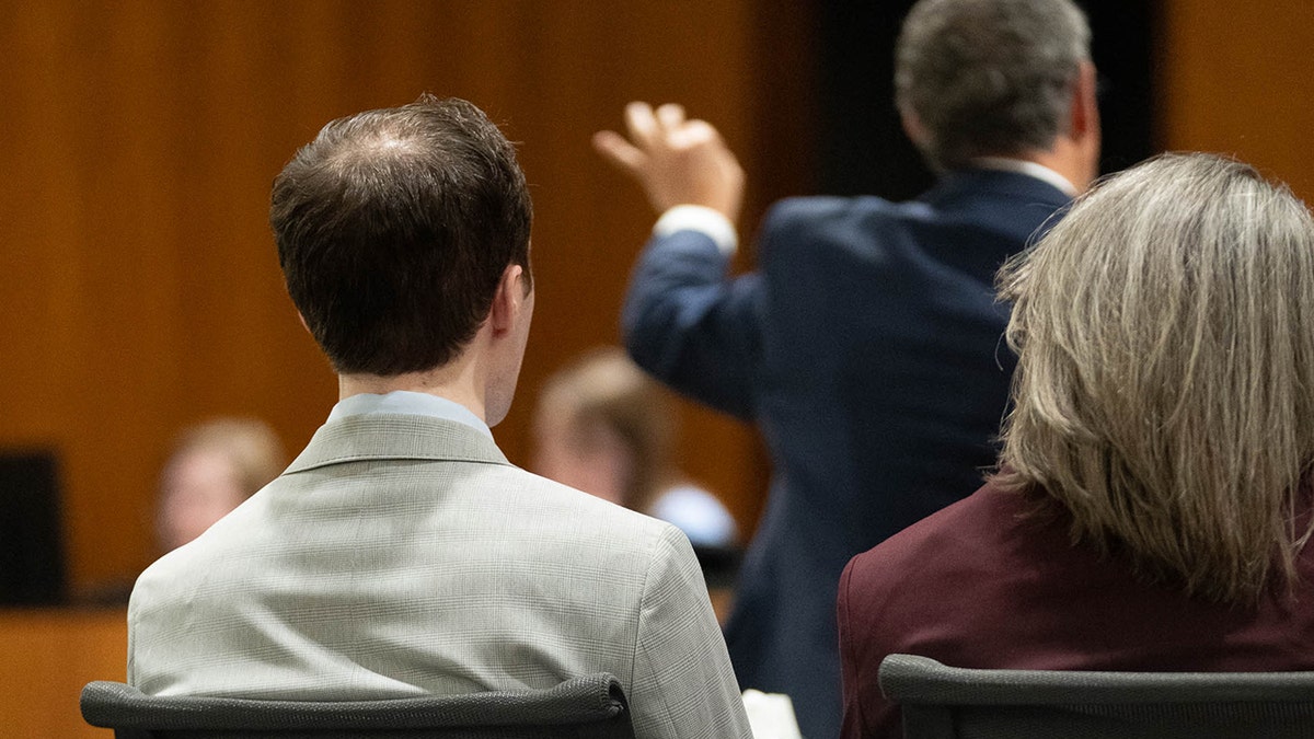 Tyler Robinson in court with his attorney.