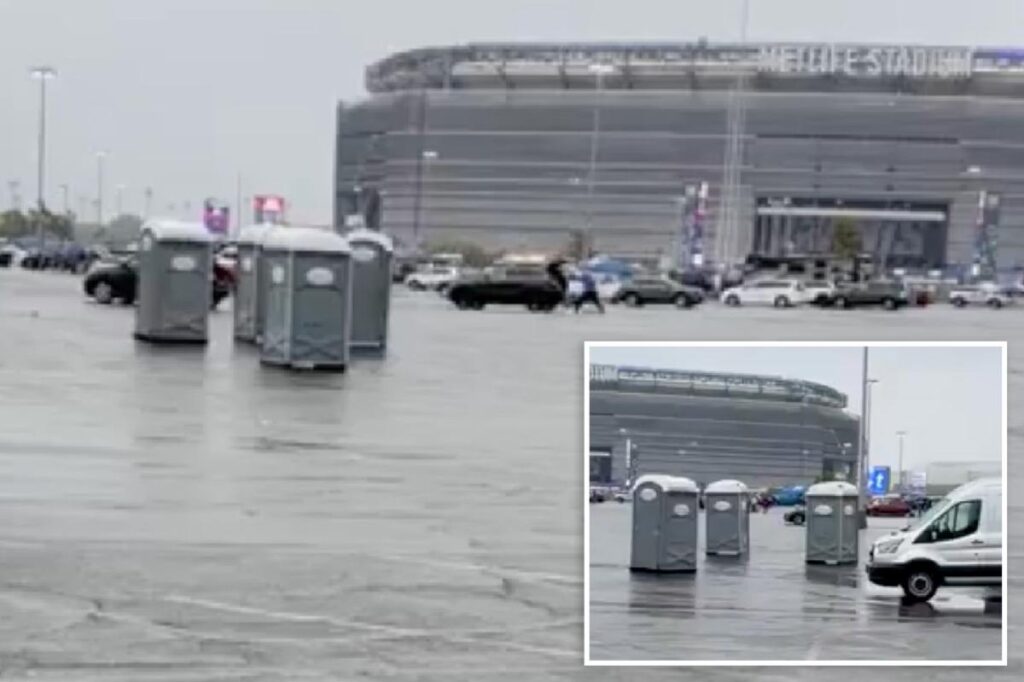 Wind-propelled portable toilets make a run for it at MetLife Stadium Wind-propelled portable toilets make a run for it at MetLife Stadium
