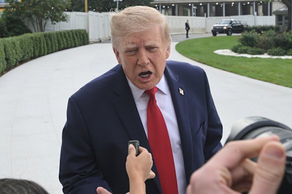 Donald Trump speaks to reporters at the weekend.