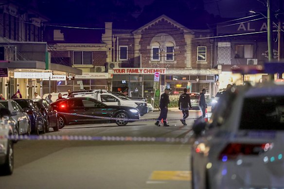 An expanded crime scene has been set up outside the community centre in Punchbowl.