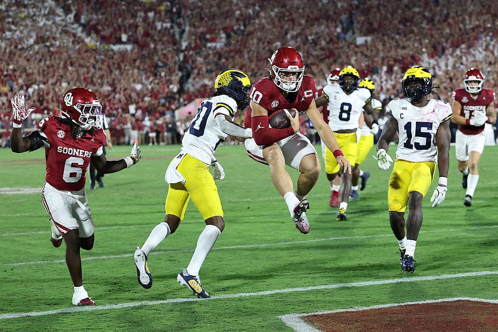 John Mateer (10) and Oklahoma defeated Michigan 24-13 in 2025. (Photo by Stacy Revere/Getty Images)