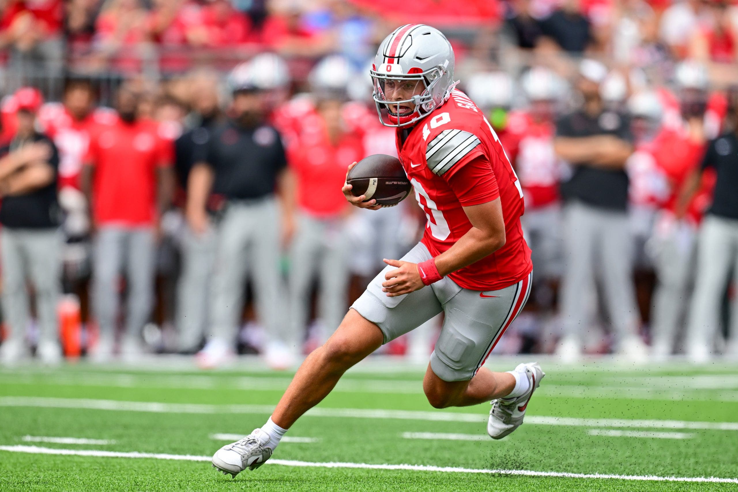 Sayin runs against Ball State in Week 1 to score a three-yard touchdown in the Buckeyes' win. (Photo by Nick Cammett/Getty Images)