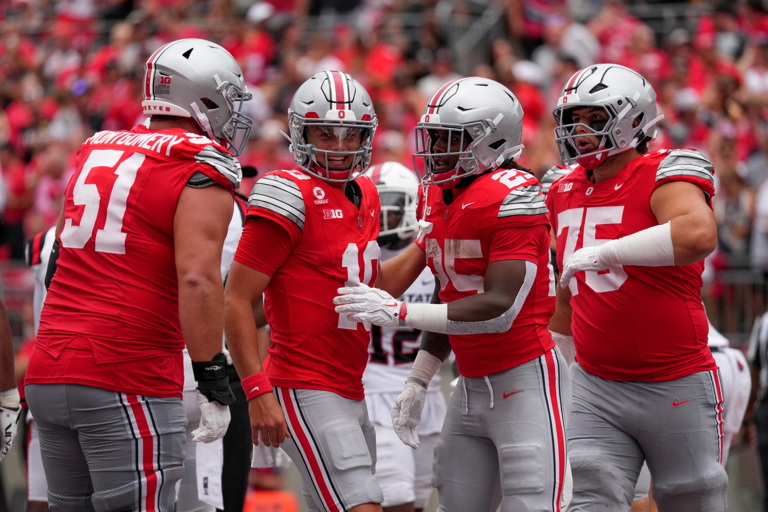 Ohio State offensive lineman Luke Montgomery, Sayin, running back Bo Jackson and offensive lineman Carson Hinzman celebrate after a touchdown against Ball State. (Photo by Jason Mowry/Icon Sportswire via Getty Images)