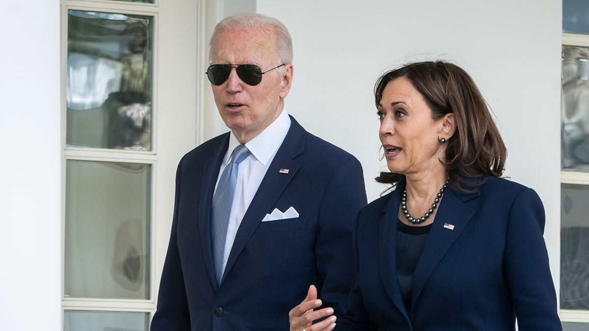 Kamala Harris and Joe Biden walking