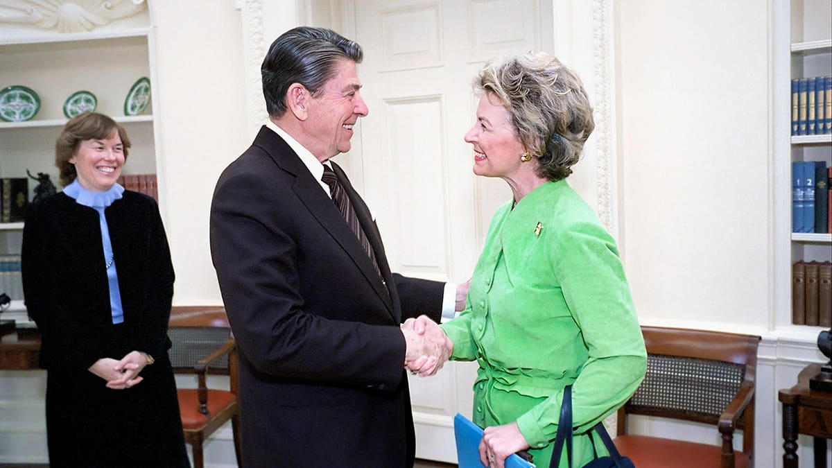 President Ronald Reagan meets with Phyllis Schlafly in the Oval Office.