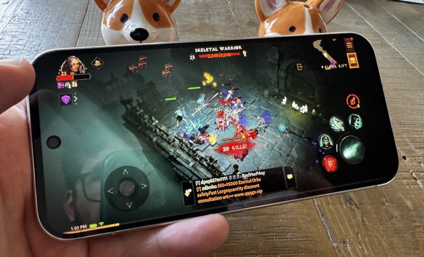 A phone is held up horizontally while playing a game.