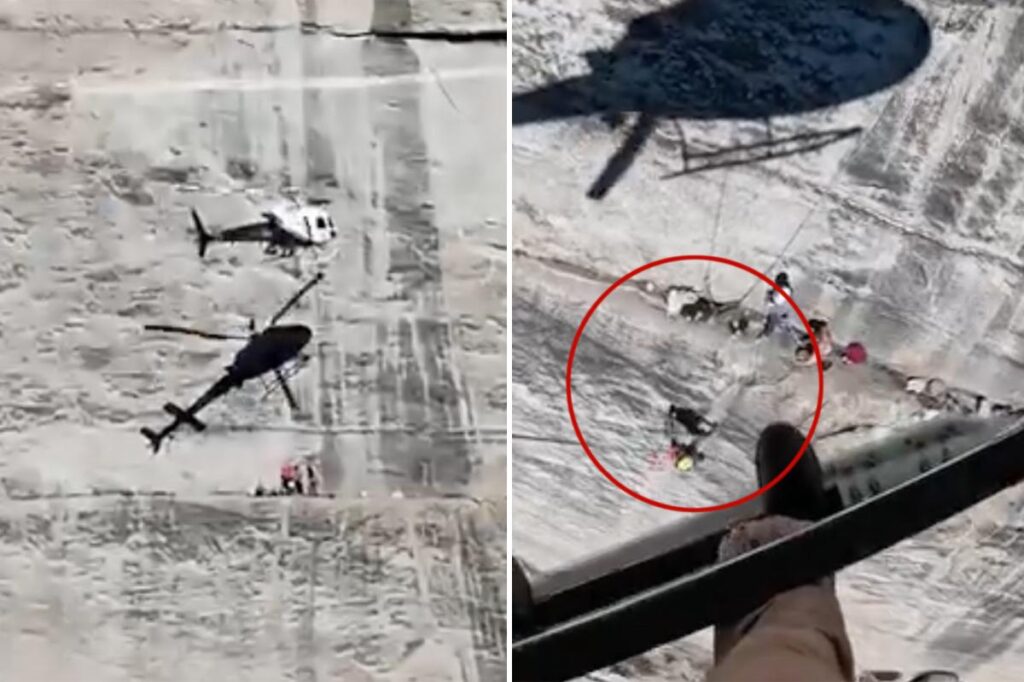 Harrowing moment helicopter hovers frighteningly close to cliff face to rescue fallen climber Harrowing moment helicopter hovers frighteningly close to cliff face to rescue fallen climber