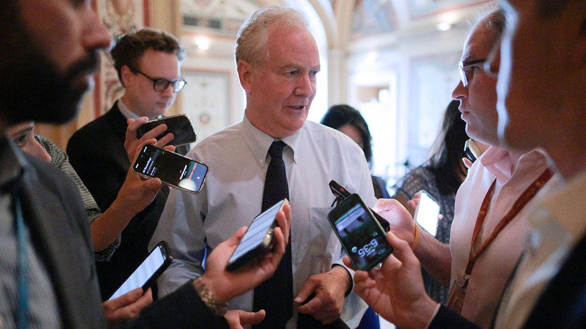 Sen. Chris Van Hollen talks to reporters at the U.S. Capitol in Washington, D.C.