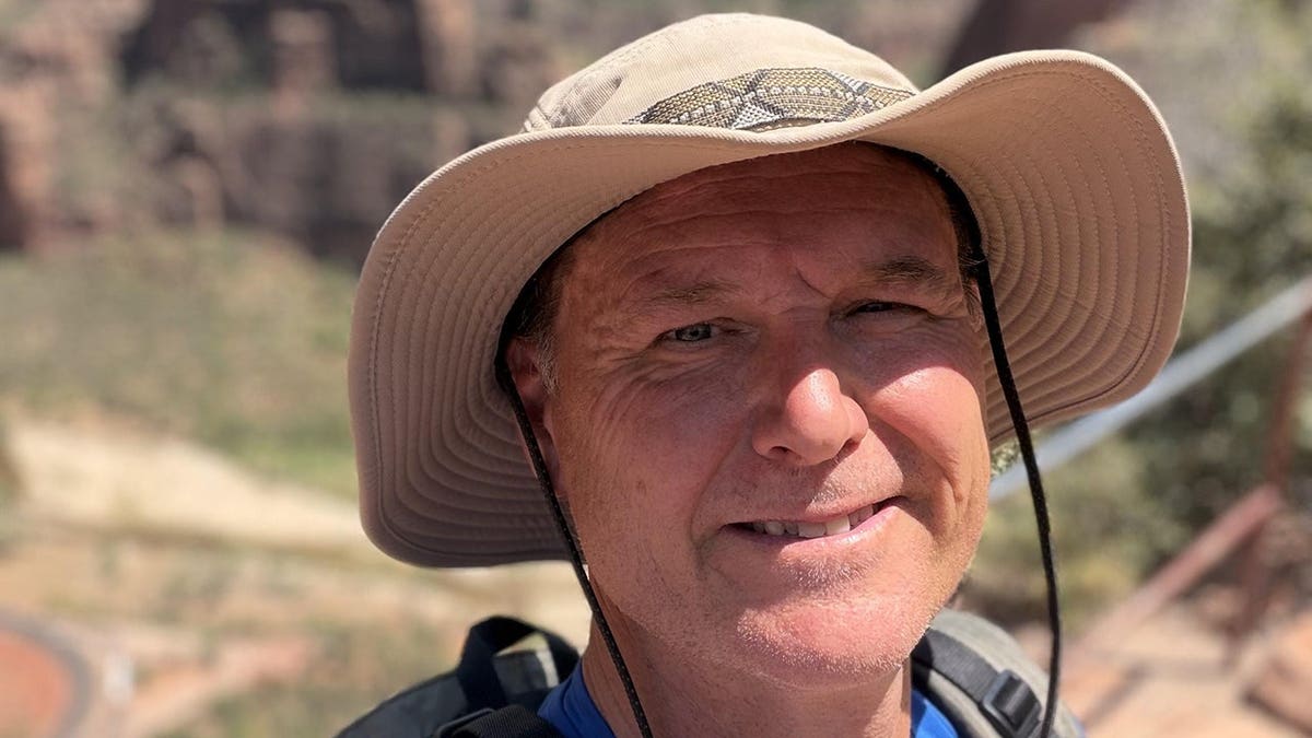 Timothy Smith poses during a family trip at Zion National Park in Utah.
